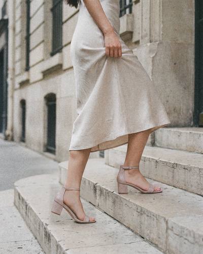 Champagne glitter J.Adams Daisy sandals on stone steps